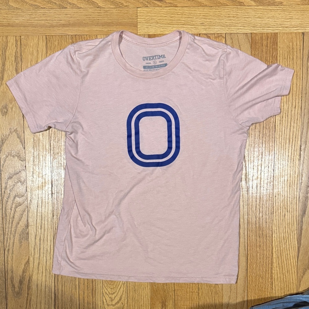 Boy’s XL Pink Overtime T-Shirt with Blue Logo. Gently used, good condition.